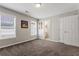 Comfortable bedroom with neutral carpet and natural light, creating a peaceful sanctuary at 4230 Glen Vista Ct, Duluth, GA 30097