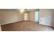 Spacious bedroom features a ceiling fan and neutral carpeting at 4230 Glen Vista Ct, Duluth, GA 30097