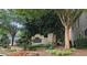 Attractive stone sign for 'The Glen at Lakeside Towne' amid lush landscaping and mature trees near the townhomes at 4230 Glen Vista Ct, Duluth, GA 30097
