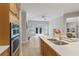 Gourmet kitchen showcases stainless steel appliances, granite countertops, and wood cabinets at 4230 Glen Vista Ct, Duluth, GA 30097
