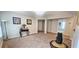 Spacious living room featuring neutral carpet, natural light, and inviting decor at 4230 Glen Vista Ct, Duluth, GA 30097