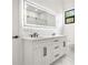 Modern bathroom featuring a spacious vanity, stylish lighting, and glass shower at 5175 Cascade Rd, Atlanta, GA 30331