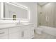 Modern bathroom featuring a spacious vanity, stylish lighting, and bathtub at 5175 Cascade Rd, Atlanta, GA 30331
