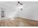 Bright bedroom with light hard wood flooring and a single window at 5175 Cascade Rd, Atlanta, GA 30331