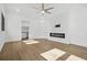 Spacious bedroom featuring wood floors, modern fireplace, and natural light at 5175 Cascade Rd, Atlanta, GA 30331