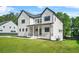 Charming new construction with a manicured lawn and covered porch at 5175 Cascade Rd, Atlanta, GA 30331