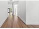 Elegant hallway featuring sleek hardwood floors and stylish wall paneling at 5175 Cascade Rd, Atlanta, GA 30331
