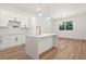 Contemporary kitchen featuring quartz countertops, hardwood floors, a kitchen island, and stainless appliances at 5175 Cascade Rd, Atlanta, GA 30331