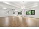 Expansive living room with hardwood floors, high ceilings, and lots of natural light at 5175 Cascade Rd, Atlanta, GA 30331