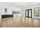 Bright open-concept layout with hardwood floors, modern lighting, and abundant natural light at 5175 Cascade Rd, Atlanta, GA 30331