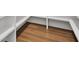 Walk-in pantry with wood-style flooring and white shelving for ample storage space at 5175 Cascade Rd, Atlanta, GA 30331