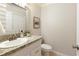 Updated half bathroom with granite countertop and modern fixtures at 1092 Old Roswell Rd, Roswell, GA 30076