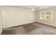 Spacious bedroom with natural light from large window at 1092 Old Roswell Rd, Roswell, GA 30076