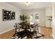 Cozy dining area with hardwood floors and view to the outdoor patio through French doors at 1092 Old Roswell Rd, Roswell, GA 30076