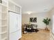 Bright kitchen with eat in area, white appliances, and wood flooring at 1092 Old Roswell Rd, Roswell, GA 30076
