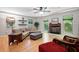 Bright living room featuring hardwood floors, a fireplace, and windows providing natural light at 1560 Bubbling Creek Ne Rd, Atlanta, GA 30319
