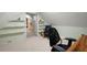 Attic area turned into an office space with custom shelves and carpeted floors at 1560 Bubbling Creek Ne Rd, Atlanta, GA 30319