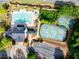 An aerial view of the tennis and basketball courts along with a beautiful pool and clubhouse at 17 Ridgeline Nw Way, Cartersville, GA 30121