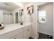 Bathroom boasts a vanity with a sleek white countertop and black matte hardware, complemented by stylish decor at 17 Ridgeline Nw Way, Cartersville, GA 30121