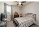 Comfortable bedroom with neutral walls, plush carpet, and a large window at 17 Ridgeline Nw Way, Cartersville, GA 30121