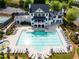 An aerial view of the expansive pool area with lounge chairs and tables, perfect for relaxation and fun at 17 Ridgeline Nw Way, Cartersville, GA 30121