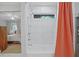 Bathroom featuring large white tiled shower with rainfall shower head at 233 Dorris Sw Dr, Marietta, GA 30060