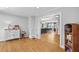 Bright living room with hardwood floors, neutral walls, and an open doorway to the dining room at 233 Dorris Sw Dr, Marietta, GA 30060
