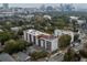 Beautiful aerial view of multi-story apartment building nestled among lush green trees in a vibrant city setting at 525 Parkway Dr Ne # 305, Atlanta, GA 30308