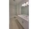 Bright bathroom with white vanity, a shower-tub combo, and modern fixtures at 525 Parkway Dr Ne # 305, Atlanta, GA 30308