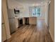 Modern kitchen with stainless steel appliances, hardwood floors, and bright natural light at 525 Parkway Dr Ne # 305, Atlanta, GA 30308