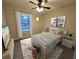 Comfortable bedroom with stylish decor, hardwood floors, and great natural light at 550 Oglesby Bridge Se Rd, Conyers, GA 30094