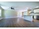 Open-concept living space features a modern kitchen and flows seamlessly into the living area at 550 Oglesby Bridge Se Rd, Conyers, GA 30094