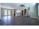 The spacious living room features open layout to kitchen and access to the backyard through French doors at 550 Oglesby Bridge Se Rd, Conyers, GA 30094