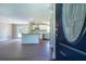 The open-concept living area and kitchen offer modern flooring and ample natural light at 550 Oglesby Bridge Se Rd, Conyers, GA 30094