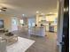The inviting living area connects to the kitchen, perfect for dining and entertaining at 550 Oglesby Bridge Se Rd, Conyers, GA 30094