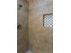 Close up of shower with stylish tile and design at 550 Oglesby Bridge Se Rd, Conyers, GA 30094