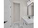 Stylish bathroom with marble floors, a sleek vanity, and contemporary black hardware at 1461 Leach Dr, Lawrenceville, GA 30045