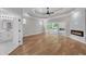 Large bedroom features wood floors, trey ceiling, access to deck and ensuite bathroom at 1461 Leach Dr, Lawrenceville, GA 30045