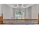 Entry foyer with a soaring ceiling, lots of windows and a stone accent wall at 1461 Leach Dr, Lawrenceville, GA 30045