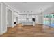 Modern kitchen with white cabinets, a large island, and stainless steel appliances at 1461 Leach Dr, Lawrenceville, GA 30045