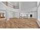 Open-concept living room connects to the kitchen and boasts hardwood floors and plenty of natural light at 1461 Leach Dr, Lawrenceville, GA 30045