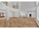 Bright, open concept living space with view to the kitchen, dining room and front door at 1461 Leach Dr, Lawrenceville, GA 30045