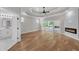 Spacious main bedroom with hardwood floors, fireplace and ensuite bathroom at 1461 Leach Dr, Lawrenceville, GA 30045