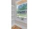 Window view to the front yard and surrounding woods at 1461 Leach Dr, Lawrenceville, GA 30045