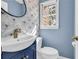 Stylish half-bathroom with custom wallpaper, a new vanity, and modern fixtures at 2151 Hamstead Ct, Suwanee, GA 30024