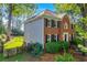 Two-story home with brick and siding exterior and fenced backyard at 2151 Hamstead Ct, Suwanee, GA 30024