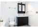 Modern bathroom featuring a dual sink vanity, toilet, shower and tub combination at 2901 Lenox Ne Way # 902, Atlanta, GA 30324
