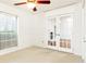 Bright bedroom features glass paneled doors and a window offering natural light at 2901 Lenox Ne Way # 902, Atlanta, GA 30324