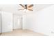 Spacious bedroom with a ceiling fan and convenient access to closets at 2901 Lenox Ne Way # 902, Atlanta, GA 30324