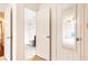 Hallway view showcasing bathroom and bedroom doors for convenient access at 2901 Lenox Ne Way # 902, Atlanta, GA 30324
